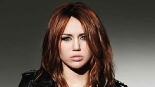 pictures of miley cyrus smoking salvia. Miley Cyrus scandalo droga